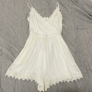 white flowery jumper